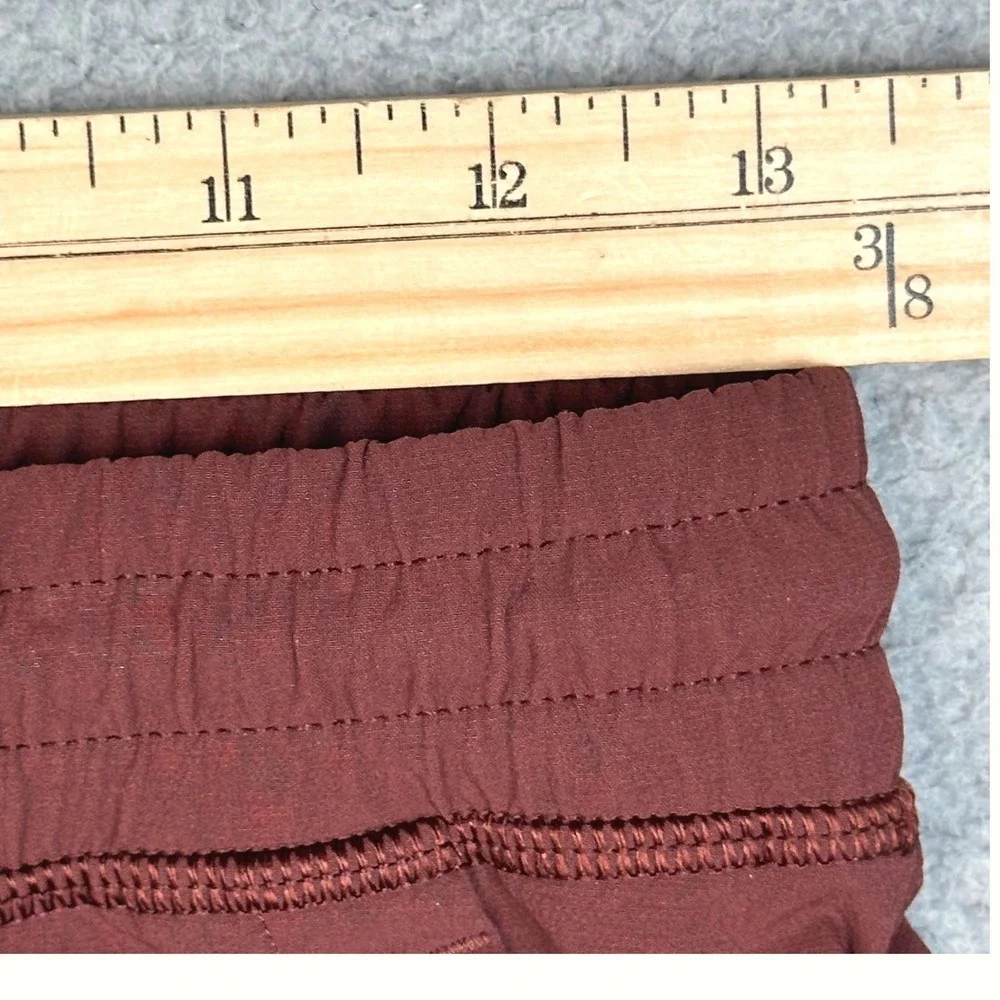 Cotopaxi Subo Pants Women XS Rust Brown Stretch Hiking Bungee Hem Gorpcore Trail